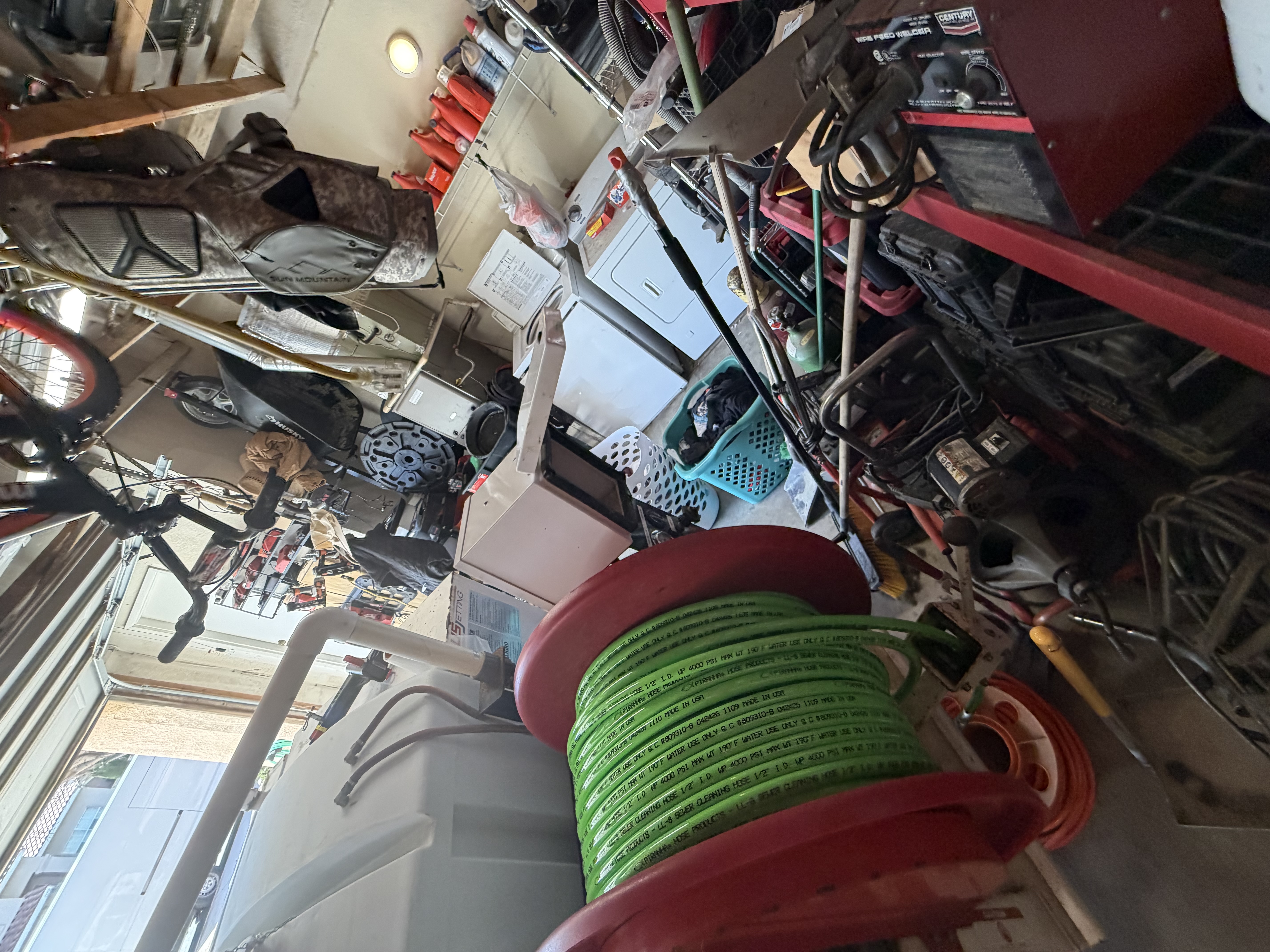 Hydro jetting hose reel and drain cleaning equipment