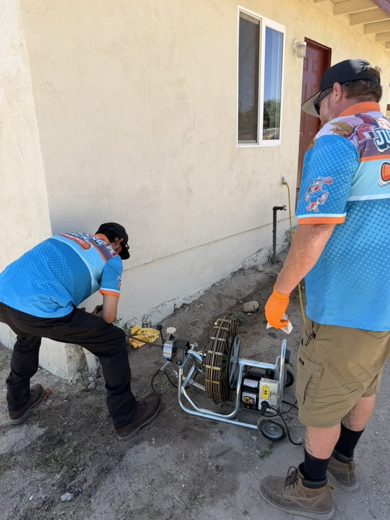 Sewer camera inspection equipment at an exterior wall